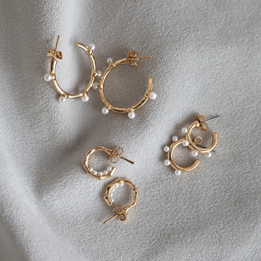 Small hoops with pearls inside Timi of Sweden