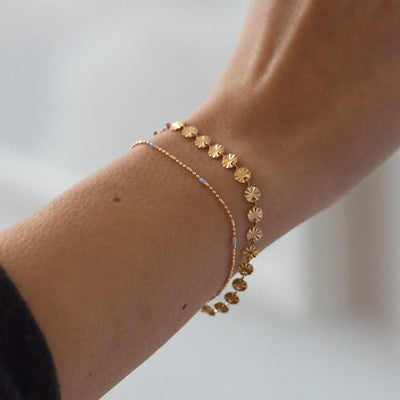 Glänzendes Armband mit Sonnenplatte