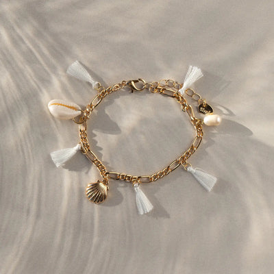 Nora - Chunky Armband mit Kaurimuscheln und Quasten